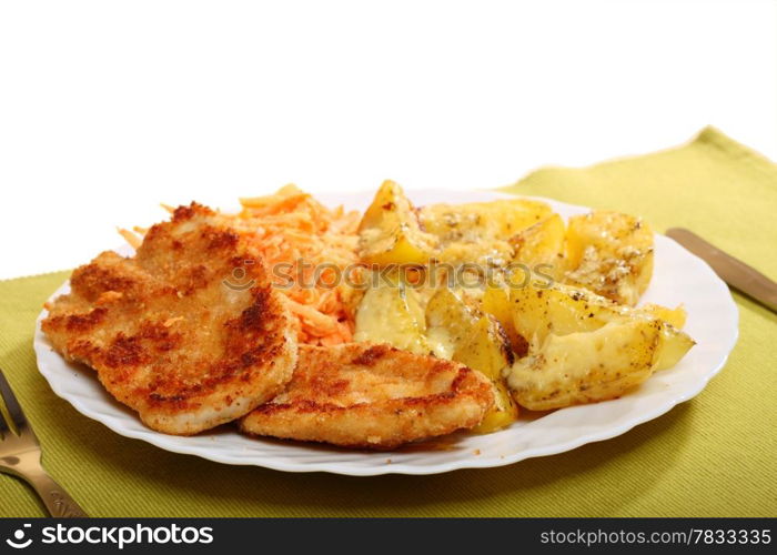 Fried chicken roasted potatos with cheese and vegetables carrot salad on white