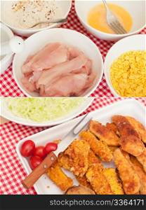 Fried Chicken Strips - Ingredients (Meat, Corn Flakes, Egg and Flour With Spices - and Ready Meal