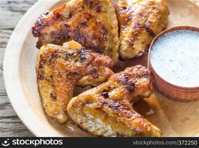 Fried chicken wings with sauce