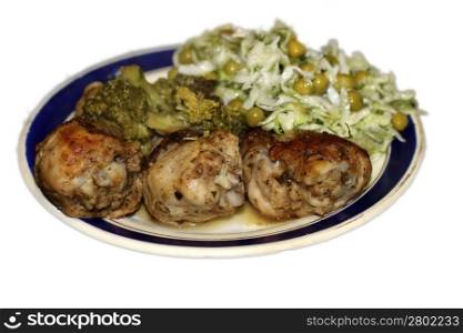 Fried chiken and cabbage broccoli on the plate
