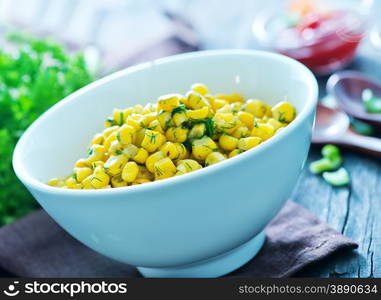 fried corn with butter and spice in the bowl