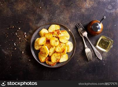 Fried Country-style Potato wedges and salt. fried potato