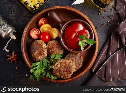 fried cutlets with tomato sauce and fresh tomato
