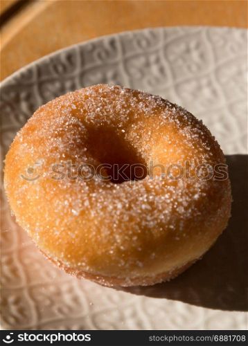 Fried Donut With Sugar in White Dish