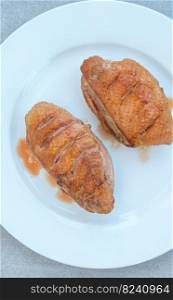 Fried duck breast on the white plate
