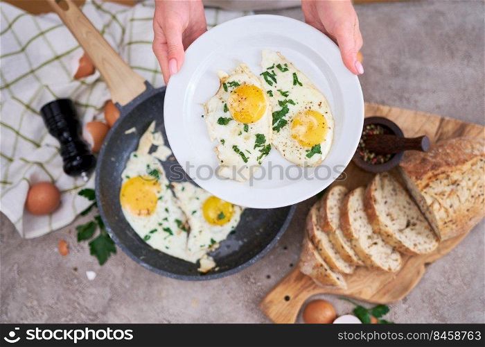 fried egg in plate at domestic kitchen.. fried egg in plate at domestic kitchen