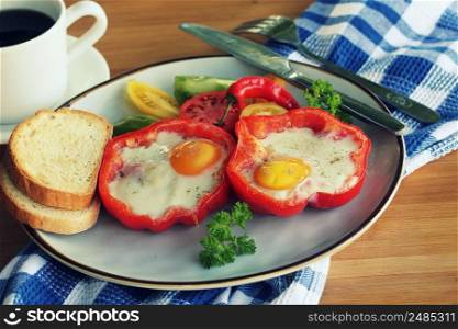 Fried egg in the ring of the bell peppers with herbs . Colorful healthy breakfast .. Fried egg in the ring of the bell peppers with herbs . Colorful healthy breakfast