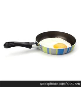 Fried egg on pan over white background