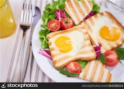 Fried Egg on Toast Bread and cup of fresh hot coffee on light grey background.. Fried Egg on Toast Bread and cup of fresh hot coffee on light grey background