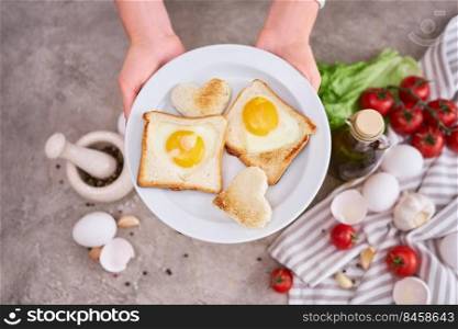 Fried Egg on Toast Bread on concrete table for Breakfast.. Fried Egg on Toast Bread on concrete table for Breakfast
