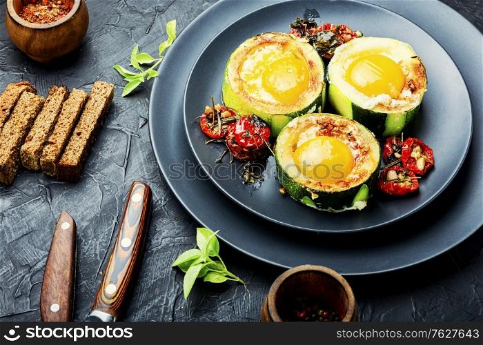 Fried eggs with tomatoes and bread in plate. Fried eggs or scrambled eggs