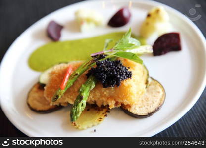 Fried fish fillet with green sauce