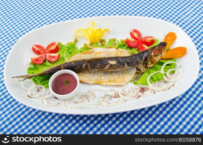 Fried fish in the plate