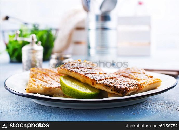 fried fish on plate. fried fish with salt and spice, fried fish,stock photo