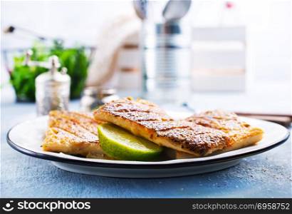 fried fish on plate. fried fish with salt and spice, fried fish,stock photo