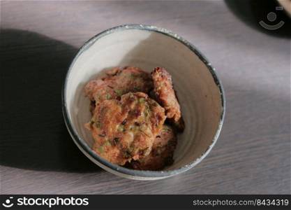 Fried fish-paste balls in bowl , THAI food