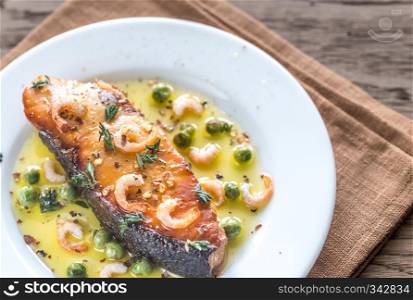 Fried fish with shrimp and peas