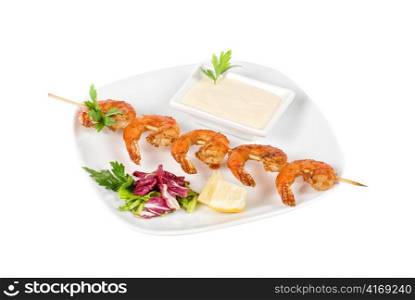 Fried kebab of shrimps with vegetables and sauce