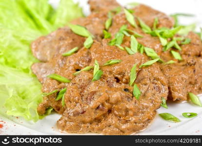 Fried liver of a rabbit stewed at sour cream