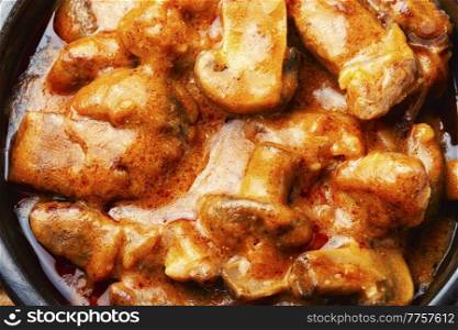 Fried meat with mushrooms, beef stroganoff from pork.. Meat with mushrooms, Beef stroganoff.