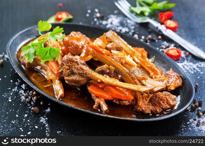 fried meat with spice on the pan