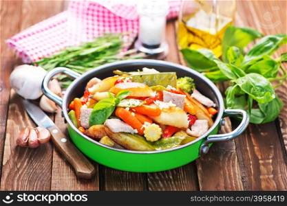 fried meat with vegetables wirh spice and salt