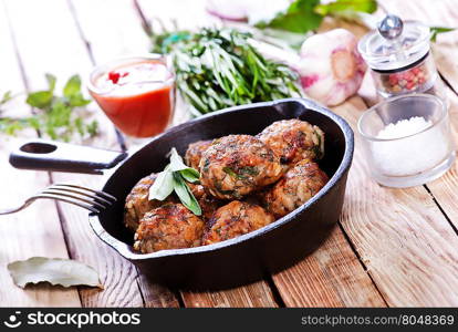 fried meatballs with spice in the pan
