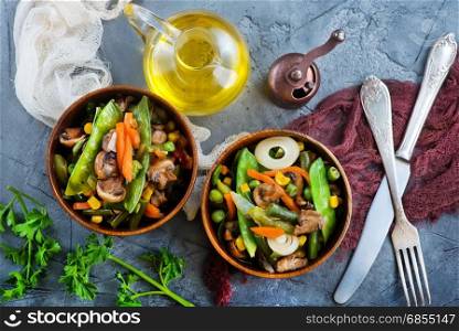 fried mix vegetables in bowl and on a table