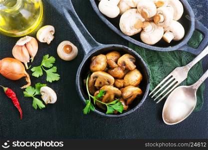 fried mushrooms in bowl and on a table
