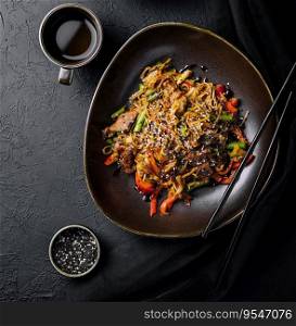 Fried noodles with veal and vegetables