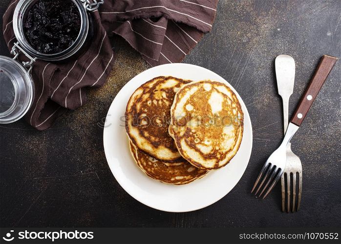 fried pancakes on white plate on a table