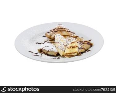 Fried pancakes with banana on an isolated background. Fried pancakes with banana
