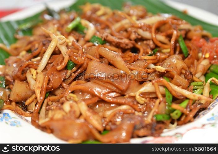 Fried Penang Char Kuey Teow which is a popular noodle dish in Malaysia