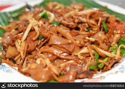 Fried Penang Char Kuey Teow which is a popular noodle dish in Malaysia