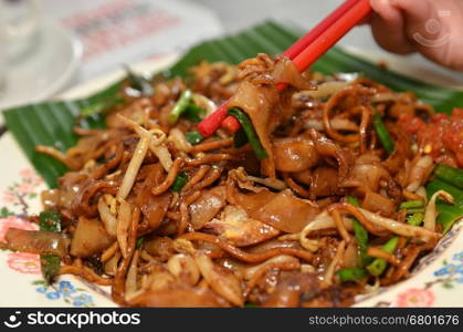 Fried Penang Char Kuey Teow which is a popular noodle dish in Malaysia