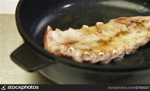 Fried Pork Ribs In A Pan, Closeup