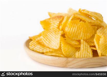 Fried potato chips isolated on white background.
