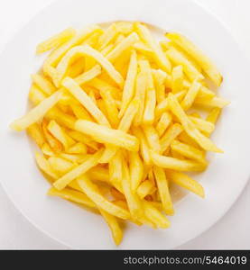 Fried potato on a white plate on the table