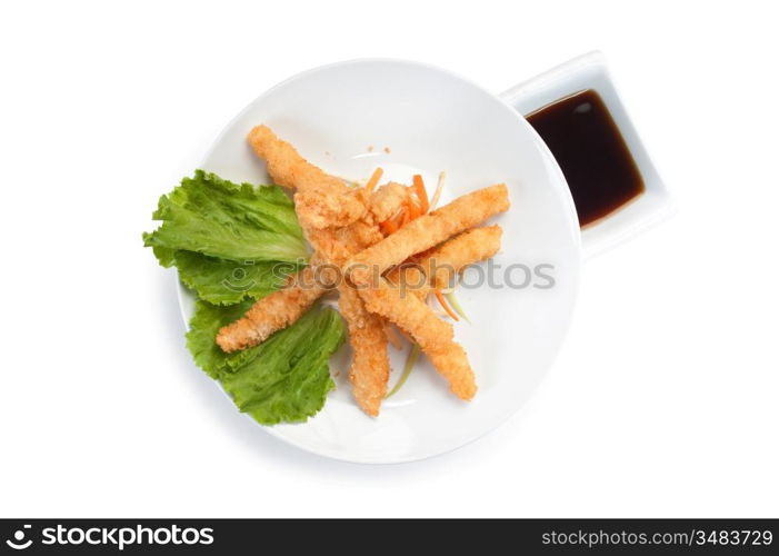 fried potatoes with sauce isolated on white background
