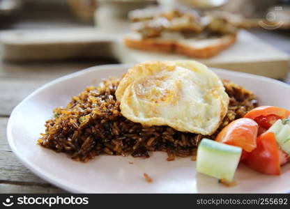 Fried rice nasi goreng with chicken and vegetables