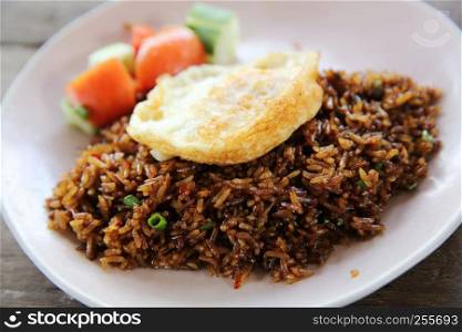 Fried rice nasi goreng with chicken and vegetables