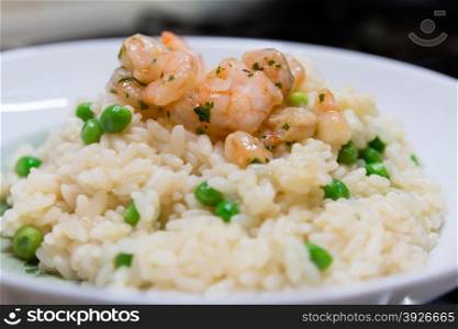 fried rice with shrimps and vegetables, closeup dish