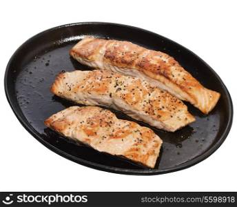 Fried Salmon Fillets In A Iron Platter Isolated On White Background