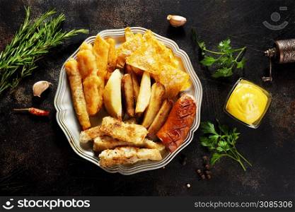 fried sausage potato fish fillet and nachos