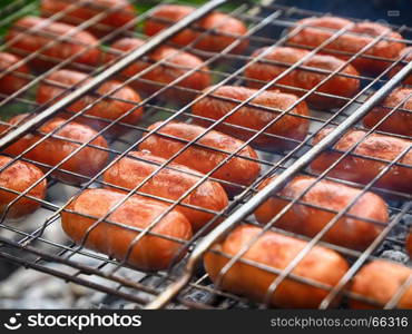 Fried sausages at the stake