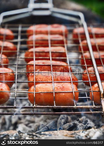 Fried sausages at the stake