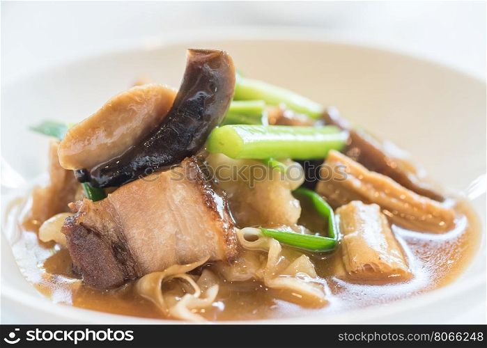 Fried seafood noodle in gravy sauce, chinese cuisine