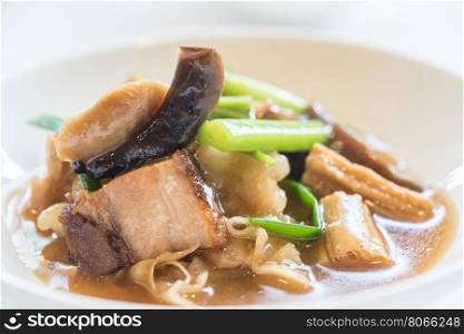 Fried seafood noodle in gravy sauce, chinese cuisine