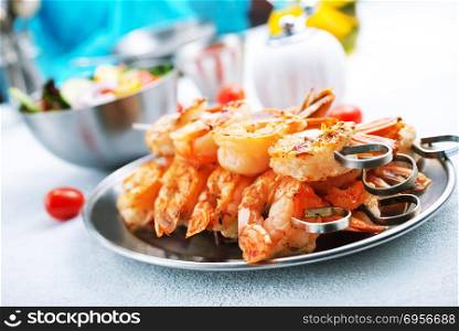 fried shrimps . fried shrimps with spice, shrimps on plate, stock photo