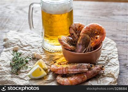 Fried shrimps with glass of beer